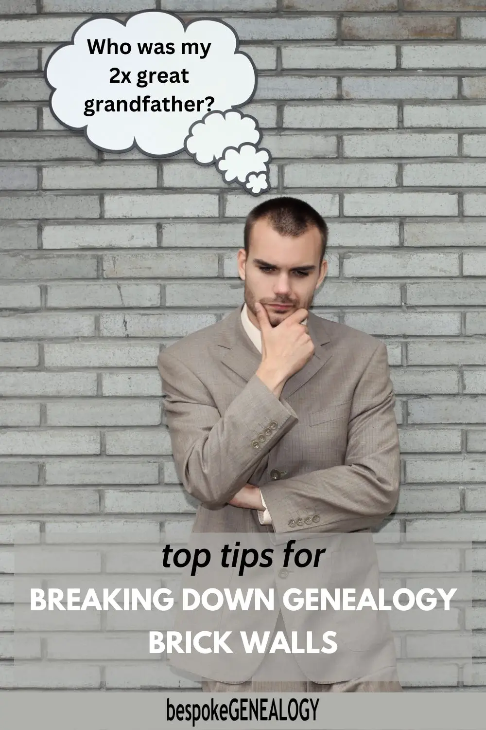 Top tips for breaking down genealogy brick walls. Photo of a man in a suit deep in thought in front of a brick wall.