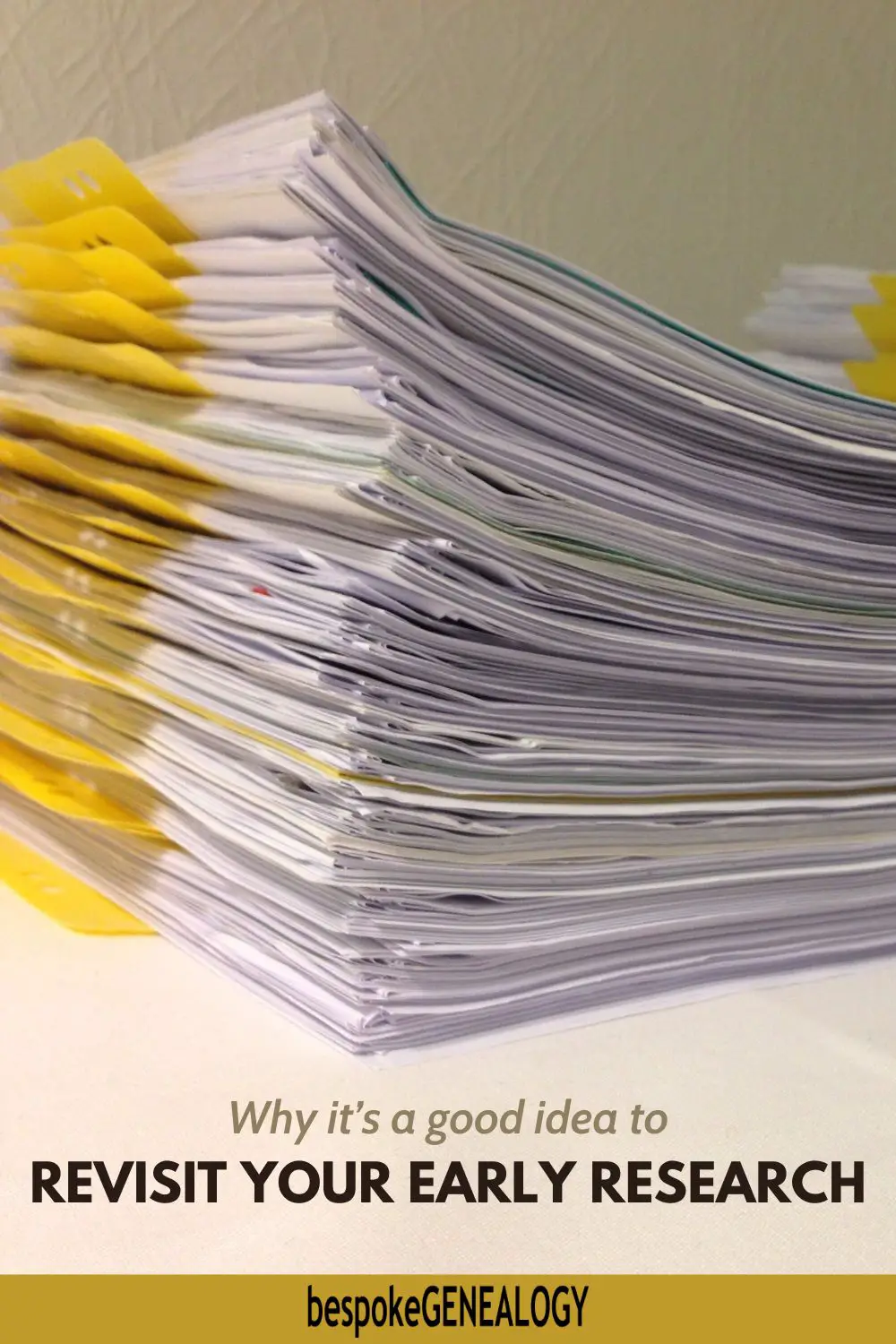 Why it's a good idea to revisit your early research. Photo of a pile of documents.