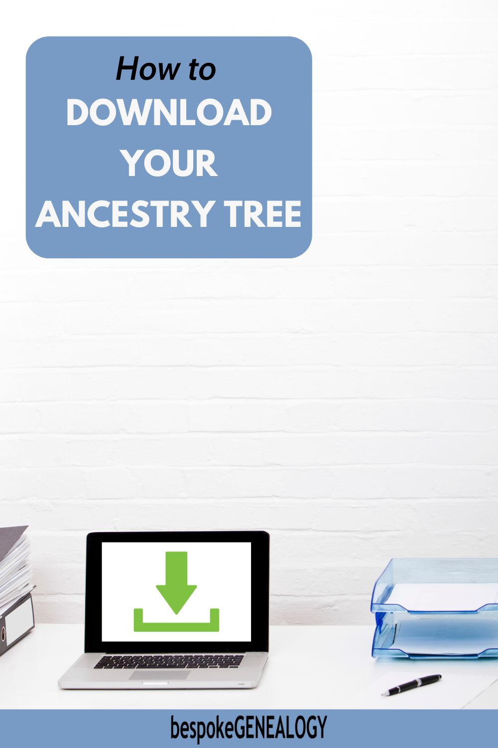 How to download your Ancestry tree. Photo of part of an office desk with some files, a laptop computer, a paper tray and a pen.
