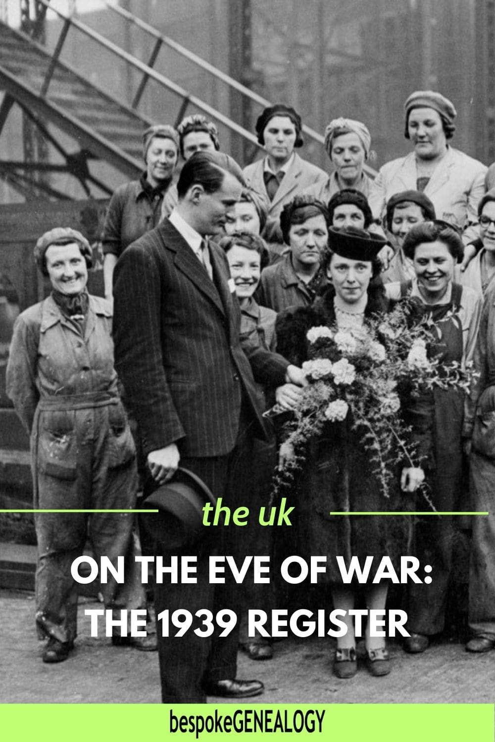 Pinterest pin. The UK on the eve if war. The 1939 Register. Photo from 1939 showing group of women in overalls behind a man in a suit who has just given a bunch of flowers to a smartly dressed woman.