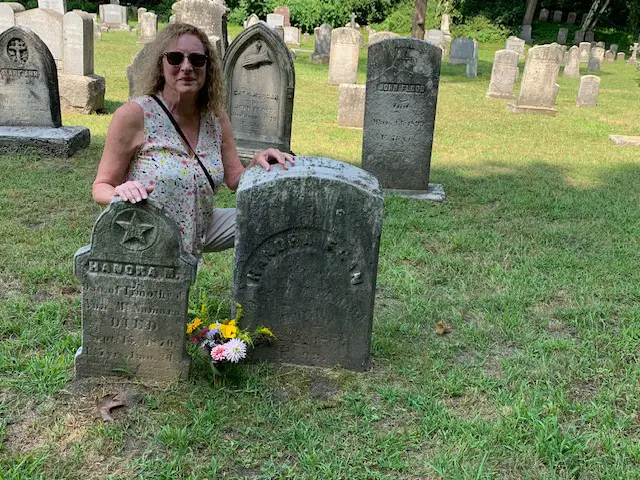 Sean Rosemeyer by the grave of her great, great grandmother in Vermont